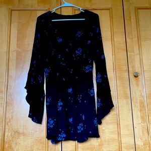 Gently used Free People Small Black Dress w/design